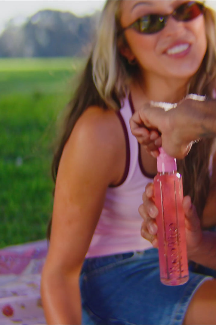 Load video: Poco Vino Rosé 187mL